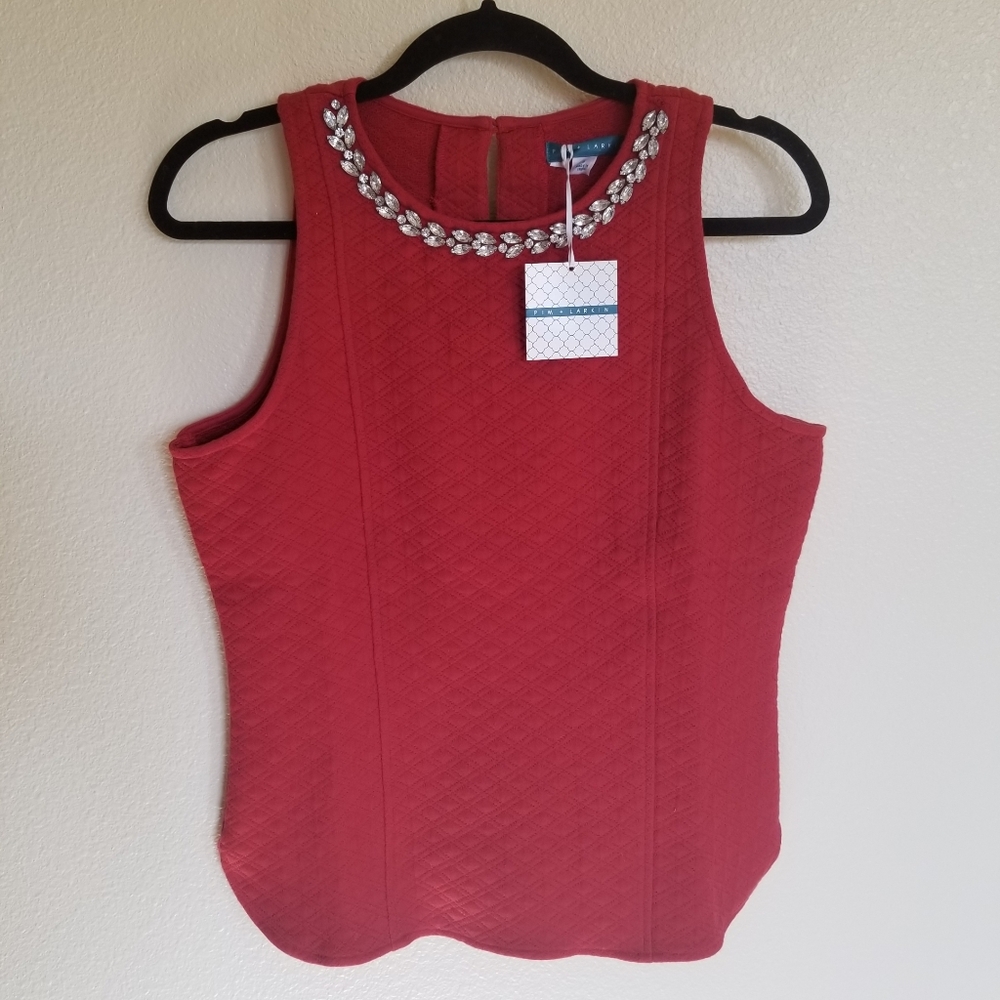 Sleeveless blouse with embellished neckline